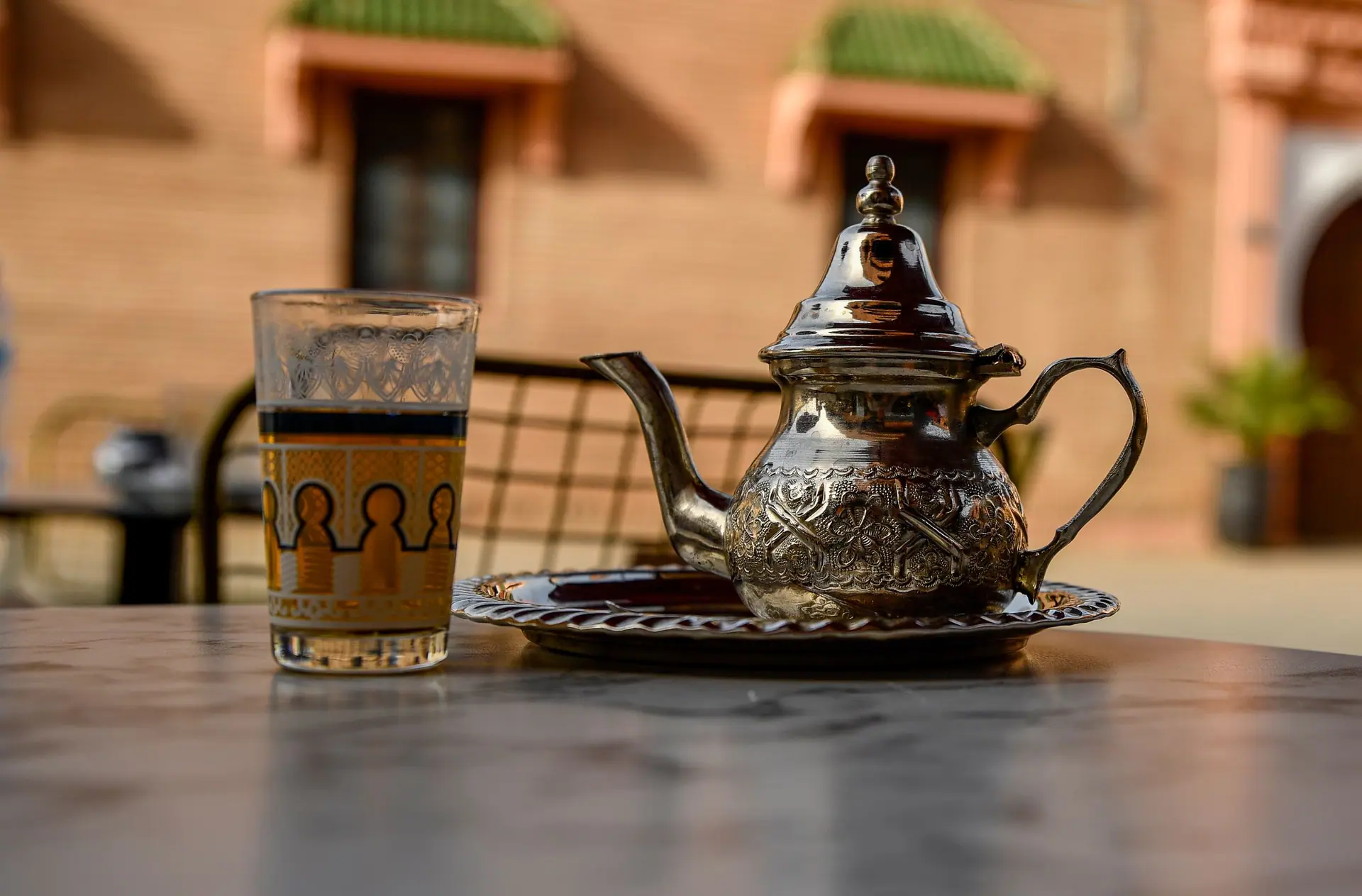 A traditional Moroccan tea set on a table in Marrakesh, Morocco.